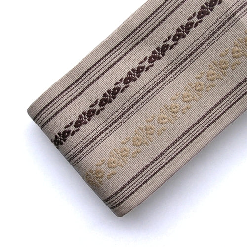 The beige kaku obi.