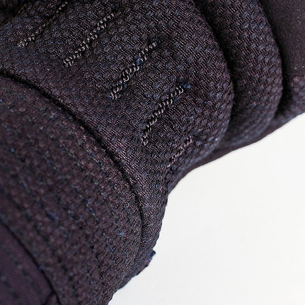 Close-up of the wrist joint and kusari kazari.
