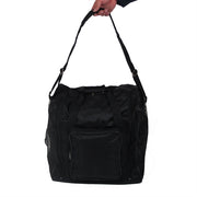 Demonstrating the long over the shoulder strap configuration.