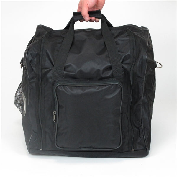 Demonstrating the shoulder strap removed and carried by the handle.