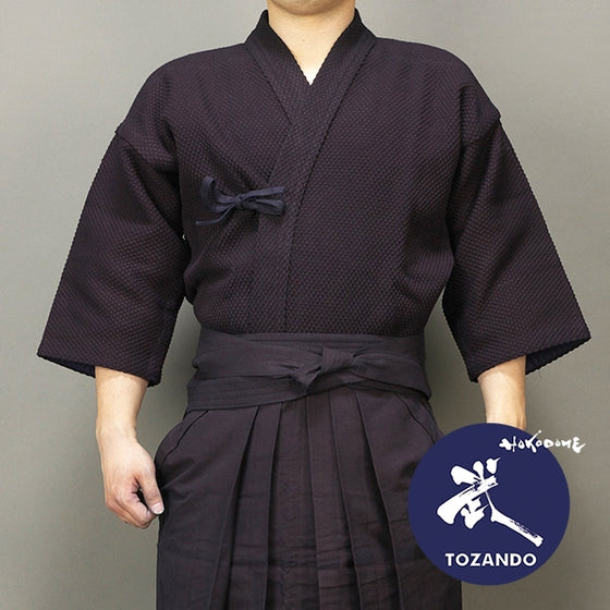 Dogi worn with hakama, front view.