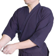 Dogi worn in kamae, side-on view.