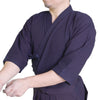 Dogi worn in kamae, side-on view.