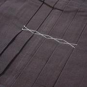 Front pleats close-up.