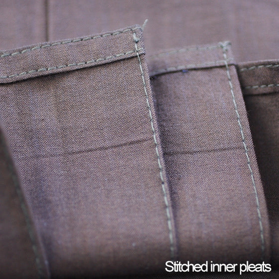 Stitched inner-pleats close-up.