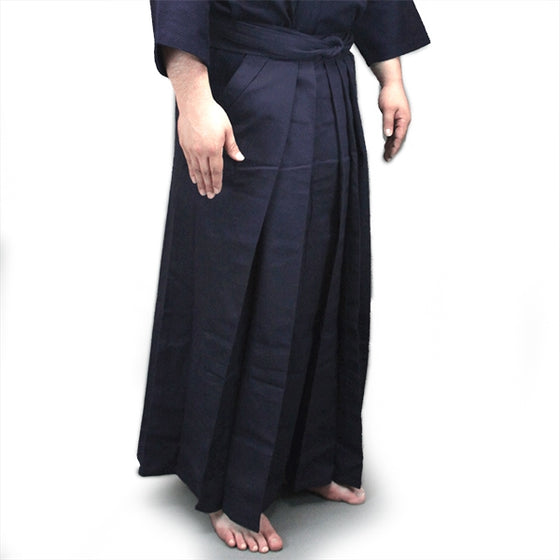Full-length slightly side on view, worn with dogi.