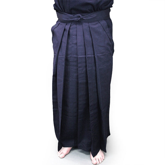 Full-length front view of pleats and fabric.