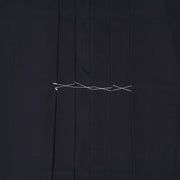 Close-up of front pleats.
