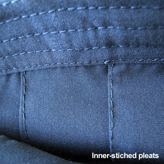 Stitched inner-pleats close-up.