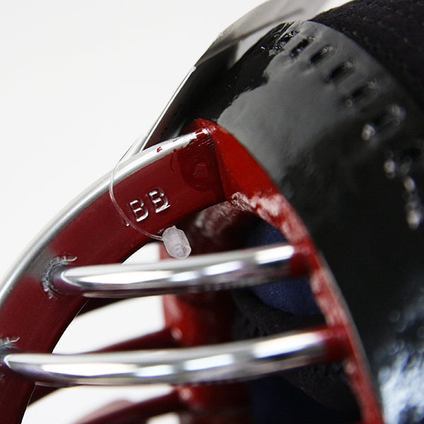 Close-up of the IBB mark on the balanced mengane.