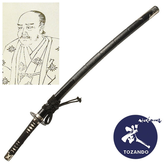 Full view of the iaito with the saya and the picture of Yagyu Jubei