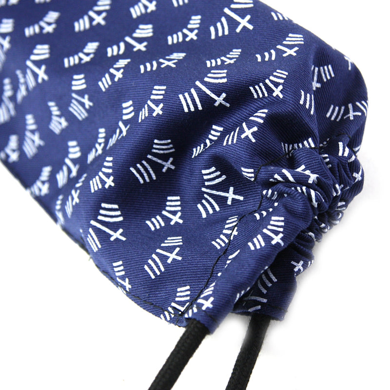 Close-up of the drawstring end and cotton canvas.