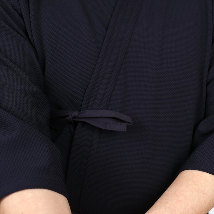 Close-up of the front of the dogi whilst worn.