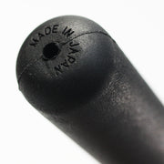 close-up of the tsuka-gashira and its made in japan stamp.