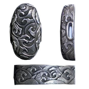 The pure silver version of the hiranami fuchi and kashira.