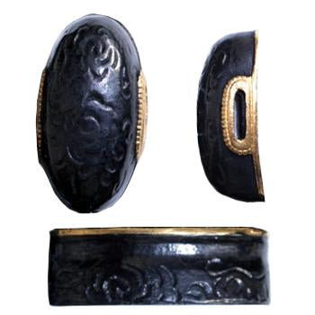 The patterns carved into these brass fittings reveal delicate swirling clouds.