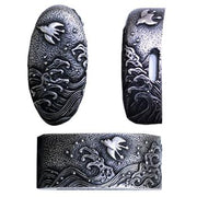 Blackened brass variation of the satsuma namichidori fuchi and kashira.