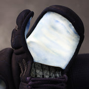 The fine white koto deerskin tenouchi, the softest leather possible.