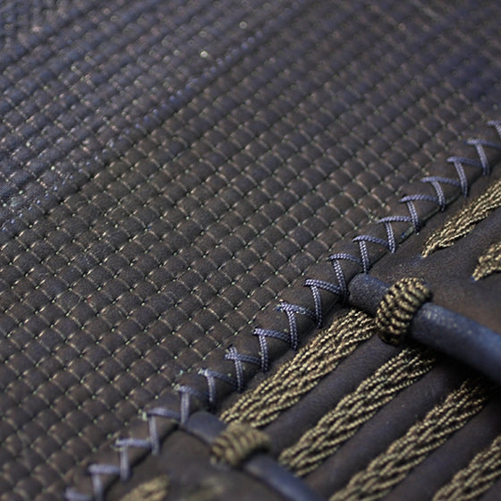 Close-up of the hara obi and chidori ito.