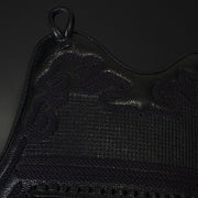 View of the hand-pressed and sewn kurozan leather mune of the do.