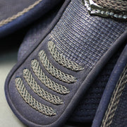 Close-up of the koto aizome deerskin tsuki-dare.