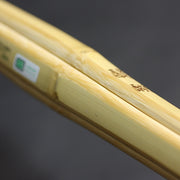 Side on view of the body, including the SG safety certification seal.