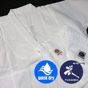 Close-up of the dogi and pants fabric with logos.