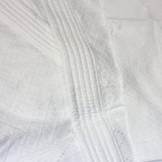 The dogi jacket seam and fabric.