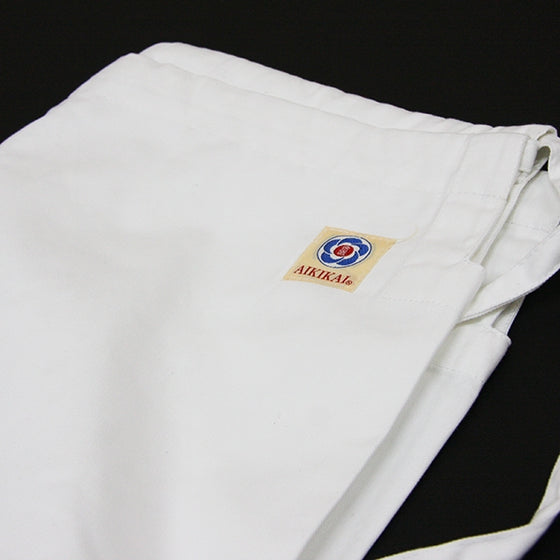 The aikikai label on the pants.
