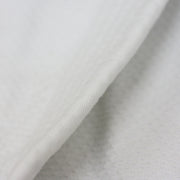 Close-up of the cotton threads.