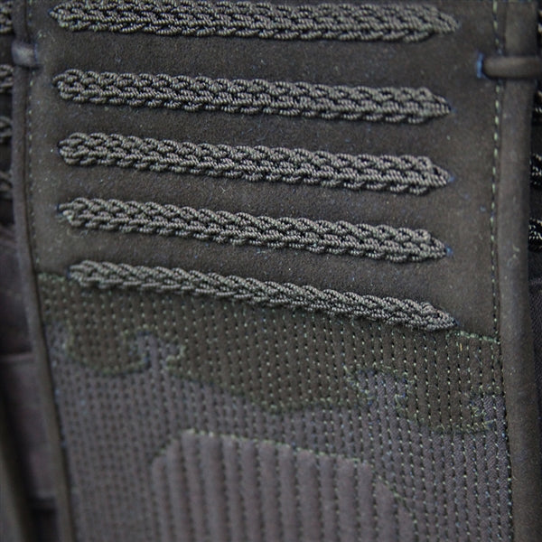 Close-up of the deerskin reinforcement and deocrative braids.
