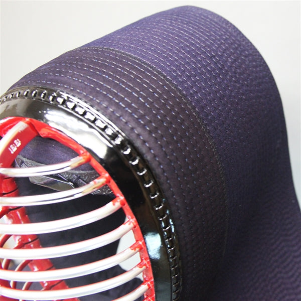 Side view of the indigo deerskin reinforcement on the menbuton.