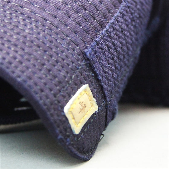 Close-up of the kote futon and the mine tag.