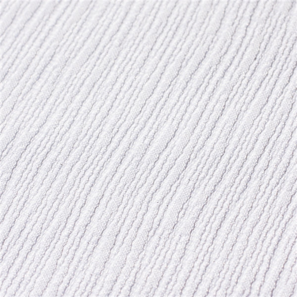 Close-up of the wave patterns on the white fabric.