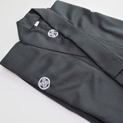 The deluxe polyester dogi folded.