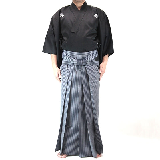 Full length view of the dogi and striped hakama set.
