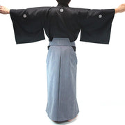 Rear view of the hakama and dogi kimono sleeves.