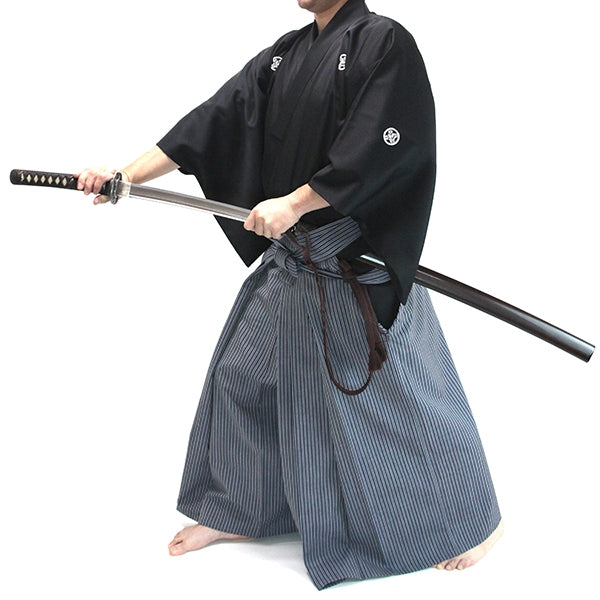 The embu uniform set seen with an iaito.