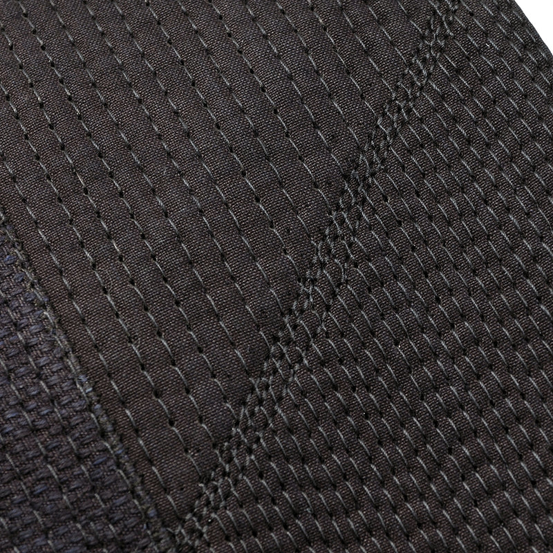 Men stitching divide close-up.