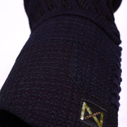Close-up of the cross-stitch futon.