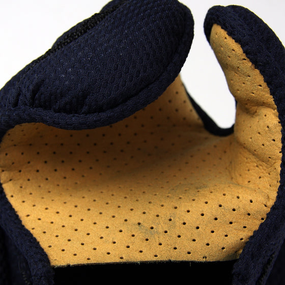 Close-up of the breathable and durable micropunch tenouchi.