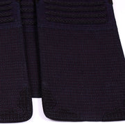 Close-up of the fukuronui odare and cross-stitch.