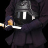 The do, tare and kote seen worn and holding a shinai.