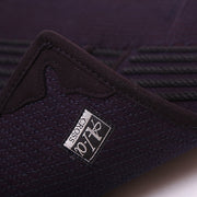 Close-up of the A-1 Alpha label on the reverse of the tare.