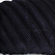 Close-up view of the orizashi cotton reinforcement on the kote.